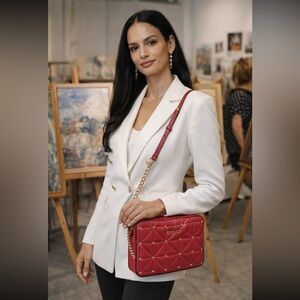 Michael Kors NWT  BOUTIQUE
Large EW Quilted Leather Crossbody Bag.